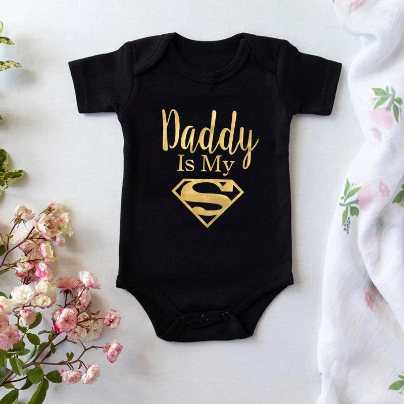 Gold Daddy Is My Hero Funny Print Short Sleeve Bodysuit Baby by Baby Minaj Cruz