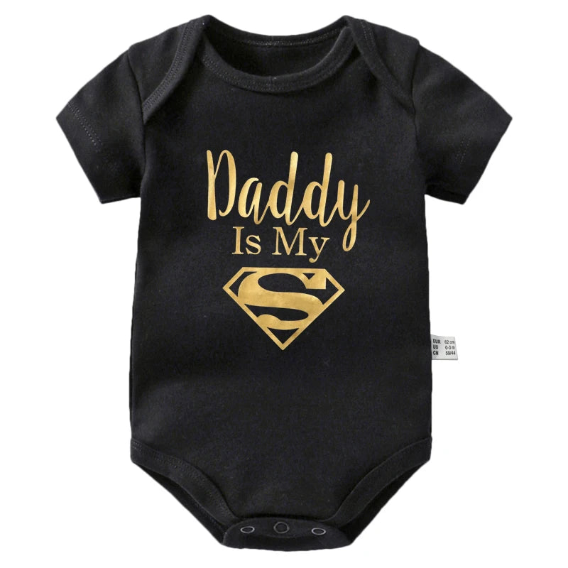 Gold Daddy Is My Hero Funny Print Short Sleeve Bodysuit Baby Gold by Baby Minaj Cruz
