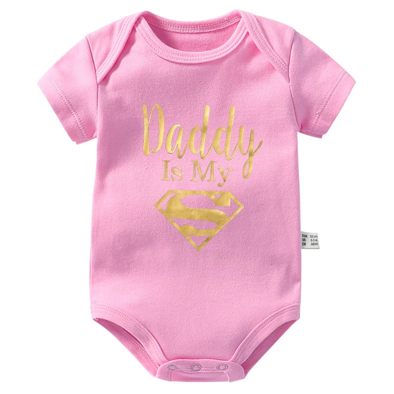 Gold Daddy Is My Hero Funny Print Short Sleeve Bodysuit Baby Pink by Baby Minaj Cruz