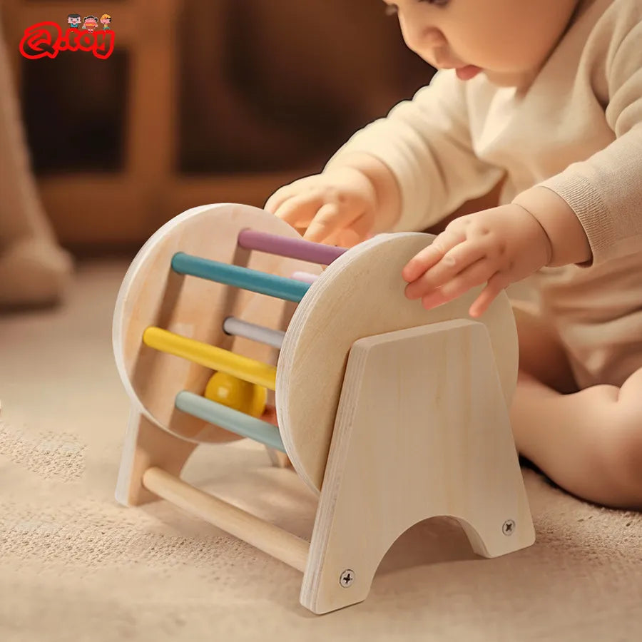 Montessori Toys for Baby Wooden Rolling Ball Drum by Baby Minaj Cruz